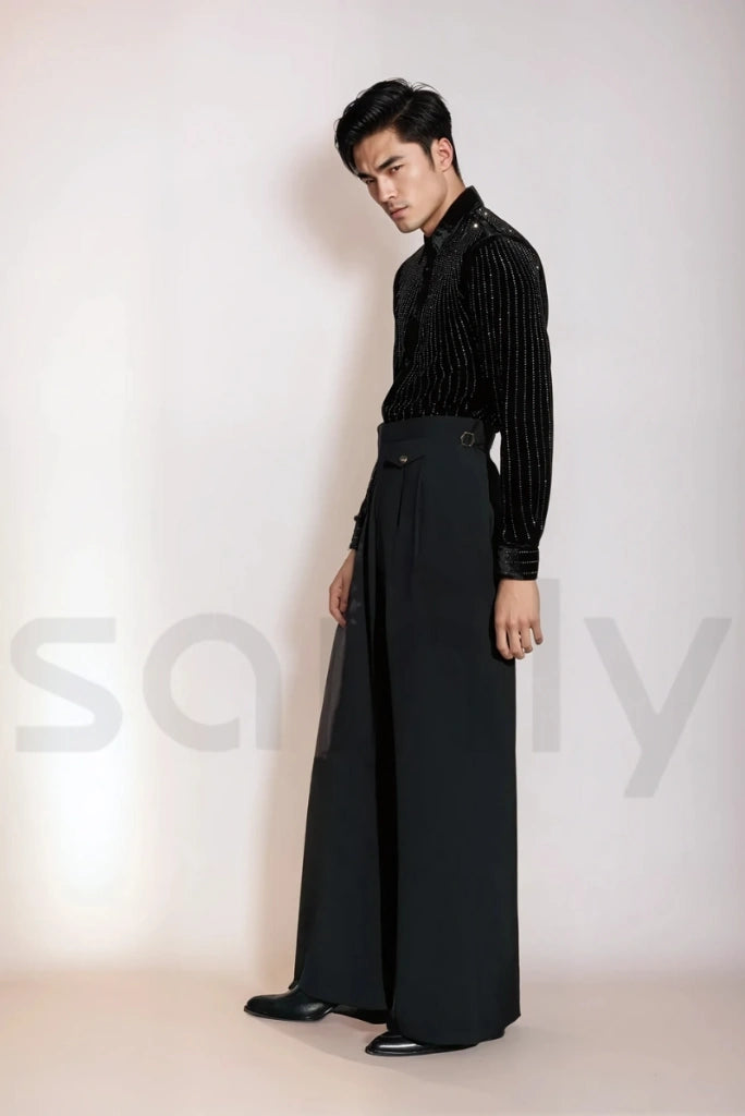 Stylish men's black bell bottom pant with wide-leg flare, ideal for vintage or streetwear looks-side