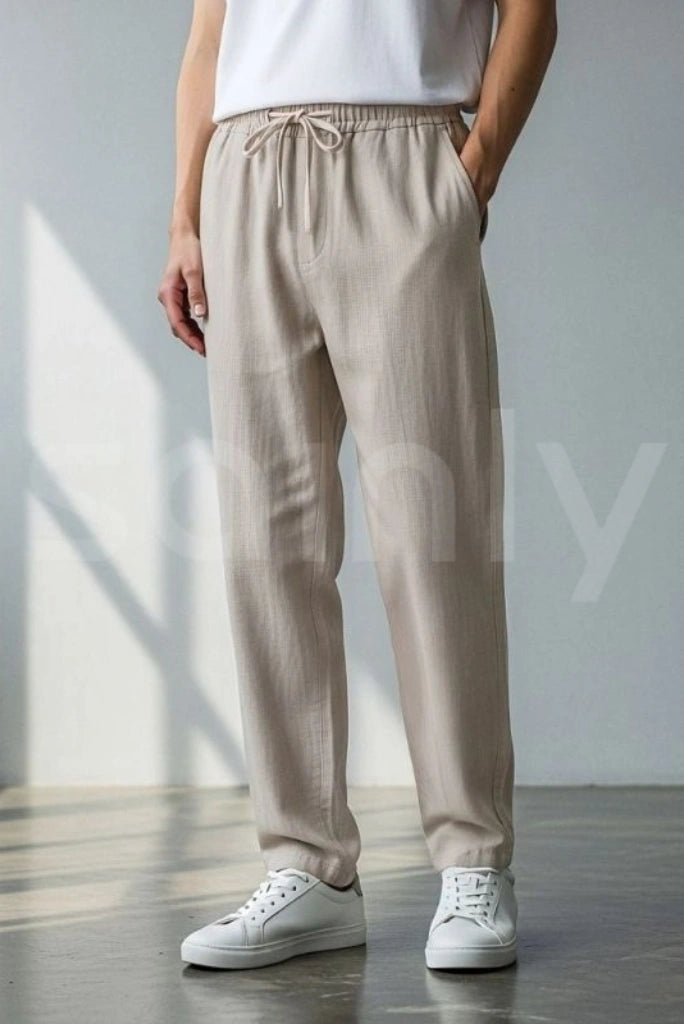 Elegant men’s off white linen trousers for night outings-front