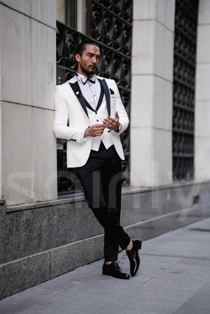 Stylish white blazer paired with black trousers-side