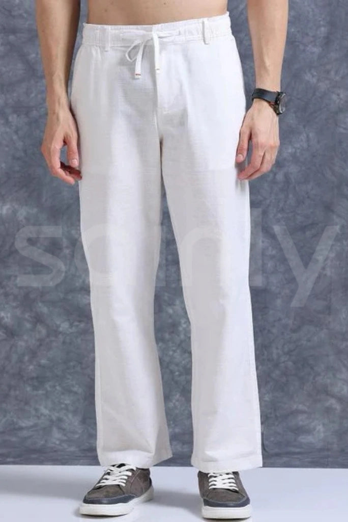 Elegant white linen trousers for festive occasions-front