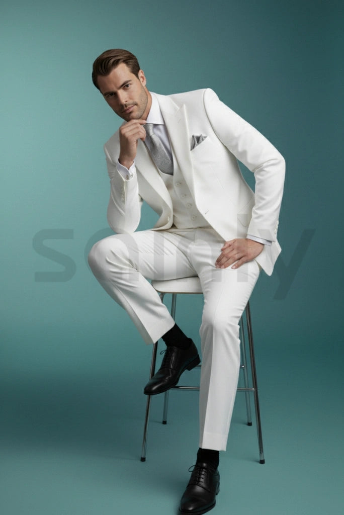 Men tailored white single-breasted tuxedo suit at a wedding-side