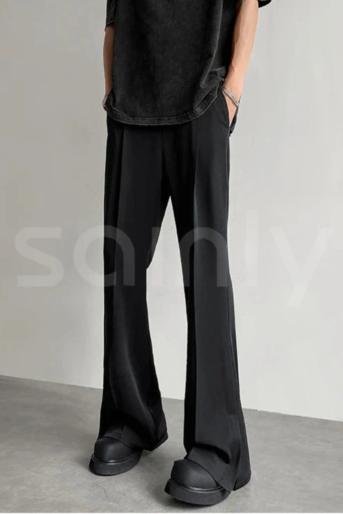 Men’s black flare bootcut pants with a tailored fit and mid-rise waist-side