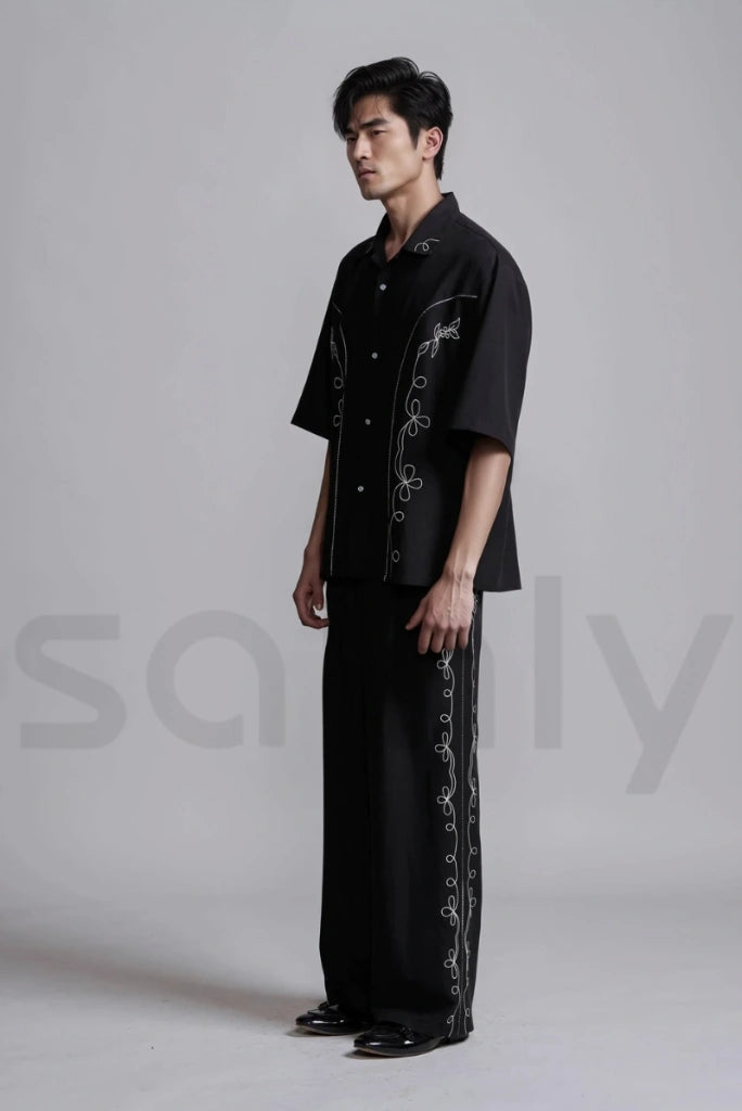 Comfortable men’s loose fit pants with white floral embroidery-side