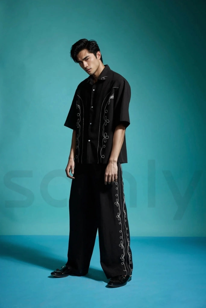Stylish embroidered black pants for men, perfect for festive occasions-side
