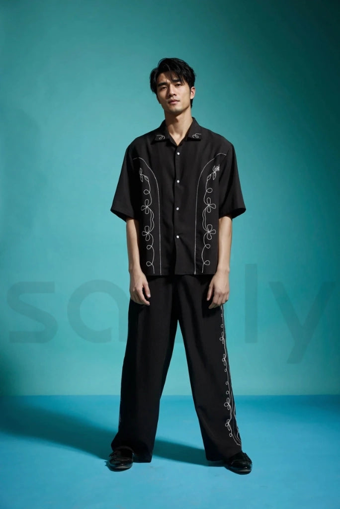 Men’s black embroidered loose fit pants for weddings and parties-front