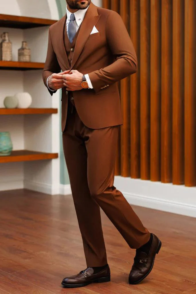 Men wearing brown three-piece suit in formal style