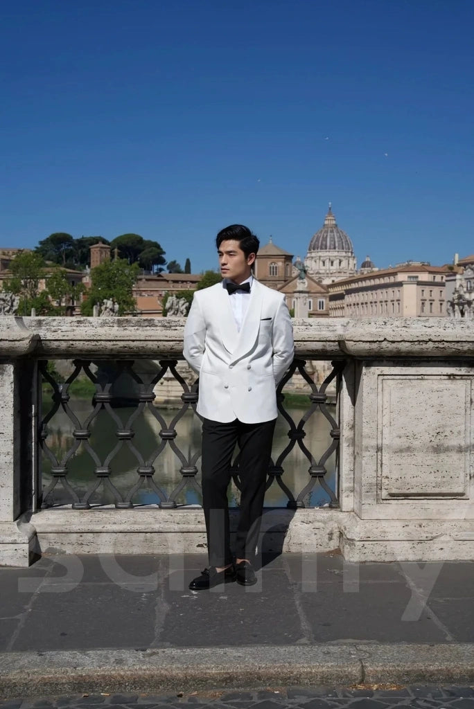 Double-breasted white suit with classic shawl lapels